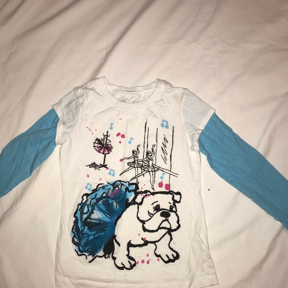 white and blue long sleeve with design